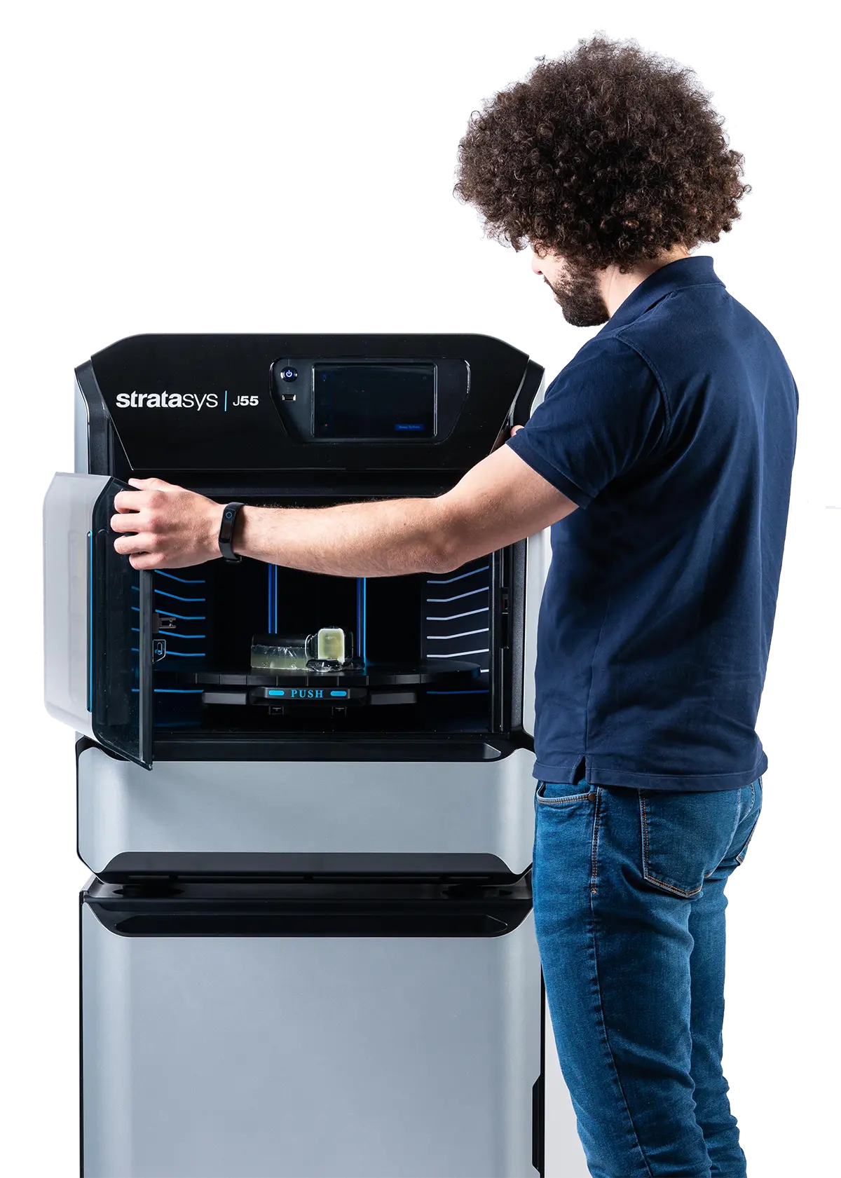 A man using the PolyJet 3D printer